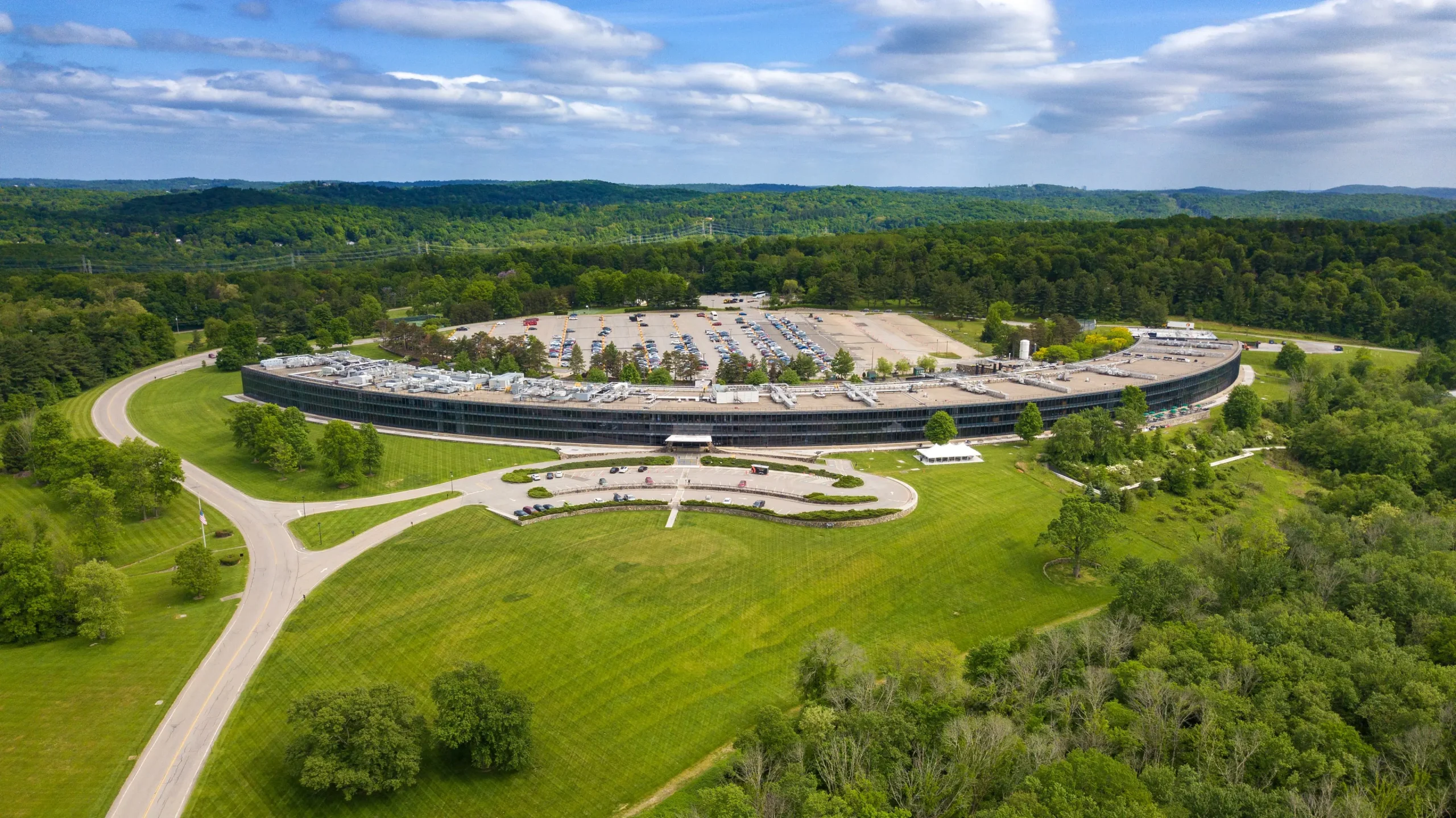 An aerial view of a large, circular building.